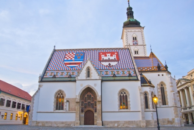 St. Mark's Church in Zagreb featuring its famous colorful tiled roof with medieval coats of arms in the Upper Town.