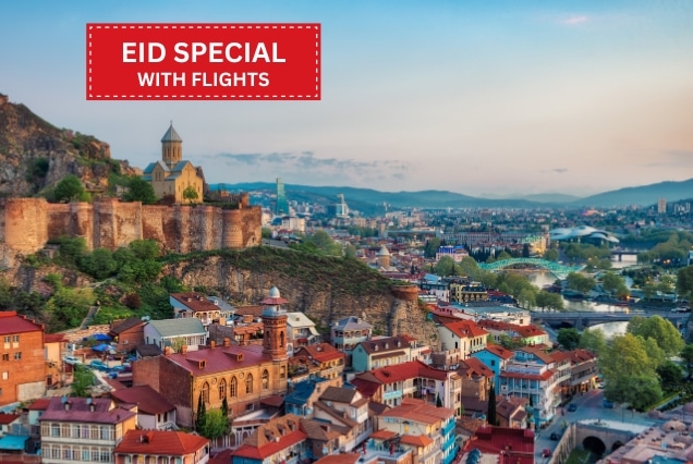 Scenic view of Tbilisi Georgia Old Town and Narikala Fortress featuring an Eid special travel package offer from Dubai.