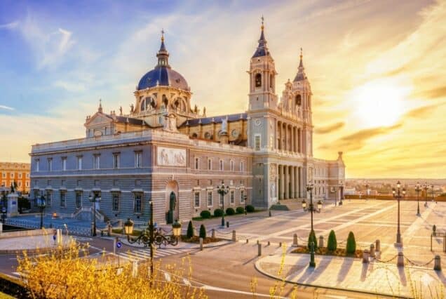 Almudena Cathedral in Madrid at sunset, a key highlight of Spain and Portugal tour packages from Dubai.
