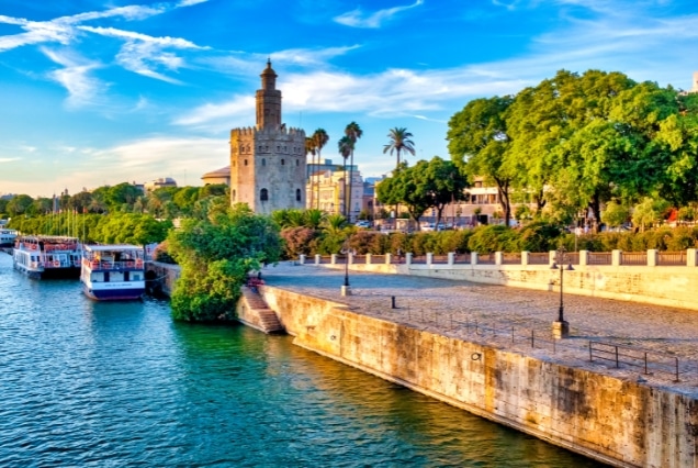 The historic Torre del Oro (Tower of Gold) by the Guadalquivir River in Seville, Spain.