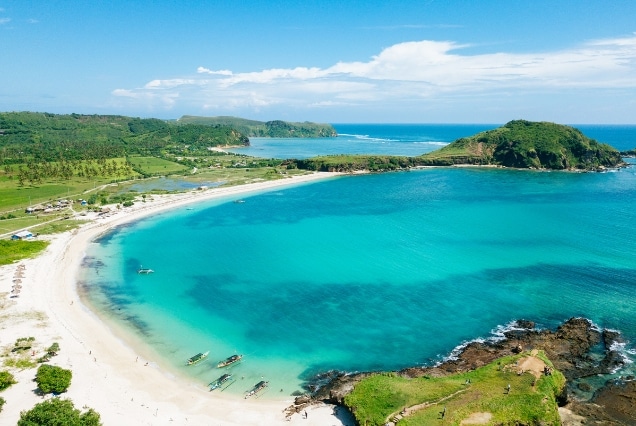 Pristine turquoise bay and white sand beaches in Lombok, a peaceful extension for first-timers using the Bali 2026 handbook.