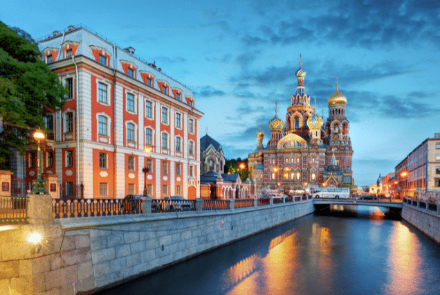 The Church of the Savior on Spilled Blood at twilight reflecting in the Griboyedov Canal, Saint Petersburg, Russia.