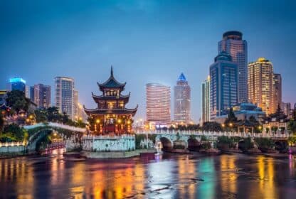Jiaxiu Tower skyline at night for China holiday packages from Dubai, UAE, blending traditional and modern views.