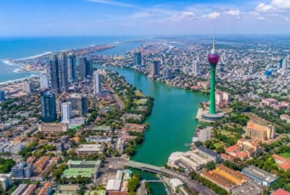 Aerial view of Colombo skyline featuring Lotus Tower and Beira Lake, perfect for travelers booking Sri Lanka holiday packages from Dubai, UAE.