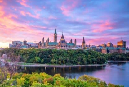 Ottawa Parliament Hill at sunset, a highlight of premium Canada Tour Packages from Dubai, UAE.