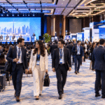 Corporate delegates walking through a MICE travel event at Dubai World Trade Centre, UAE