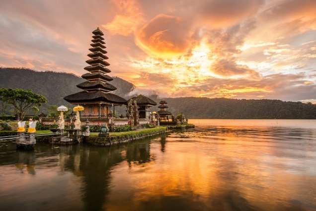 Bali lake temple with tiered pagoda roofs at golden hour – Bali Travel Package from Dubai