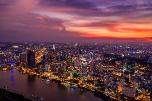 Ho Chi Minh City skyline and Saigon River at sunset, Vietnam – Hanoi and Ho Chi Minh City Tour Package