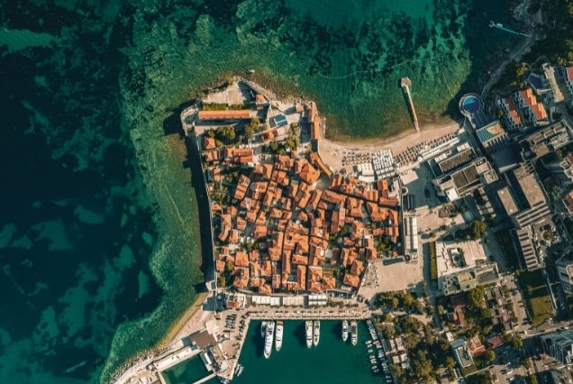 Aerial view of Budva Old Town and marina on the Adriatic coast – Montenegro Tour Package