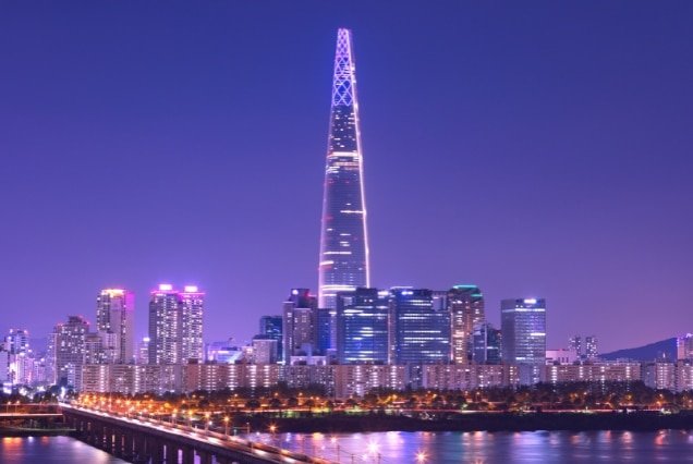 Lotte World Tower and Seoul skyline lit up at night – South Korea Tour Package