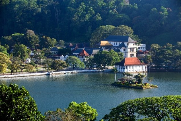 Kandy Lake and Temple of the Tooth surrounded by hills in Sri Lanka – Sri Lanka Travel Package from Dubai