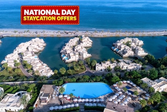 Aerial view of The Cove Rotana Resort Ras Al Khaimah lagoon villas and pool – National Day Staycation Offer